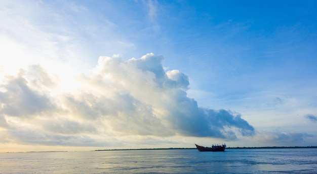 Free Photo boat on tropical river with blue sky