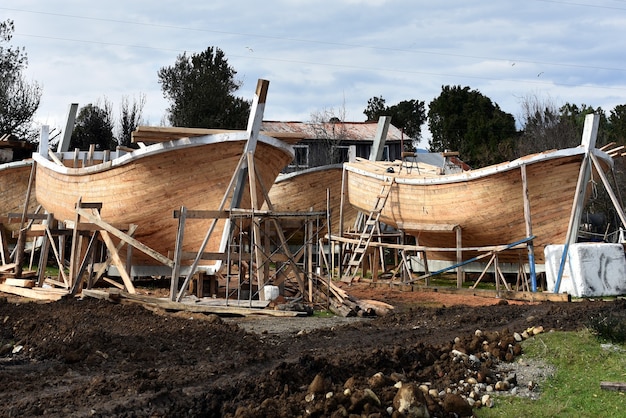 Boats being constructed in the countryside