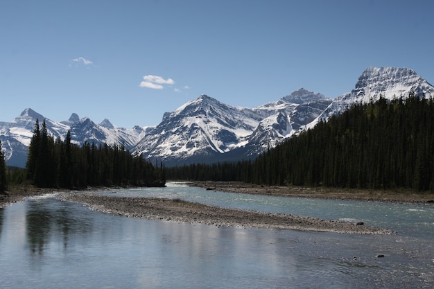 Body of water surrounded by clouds in Banff and Jasper National Parks