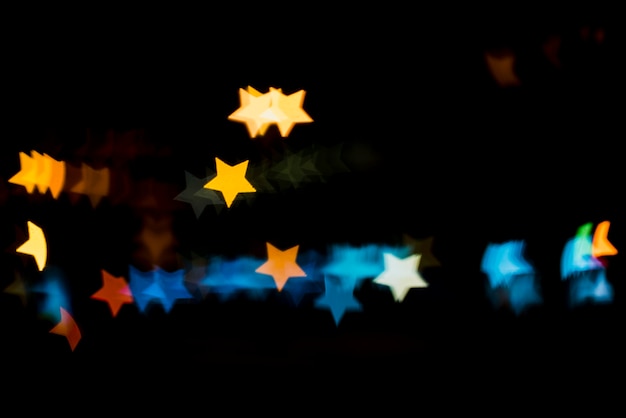 Free photo bokeh background with lights in star shape