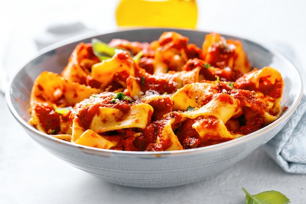 Bolognese penne pasta served on plate