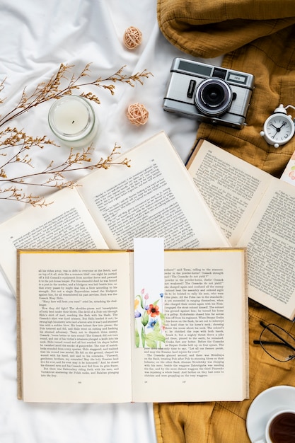 Bookmark and book arrangement flat lay