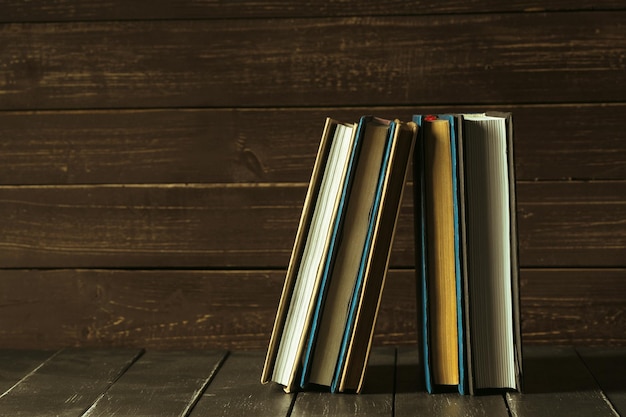 Free Photo books close up on old wooden table