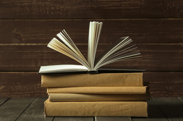 Free photo books close up on old wooden table