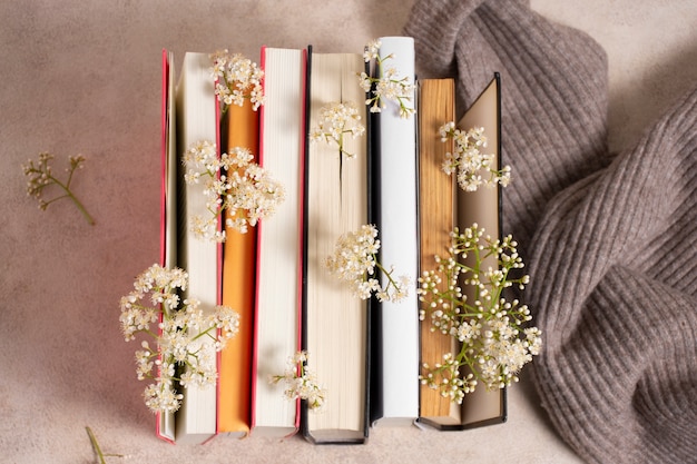 Books and flowers arrangement