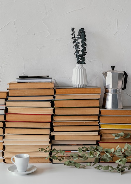 Free Photo books stack and plants assortment