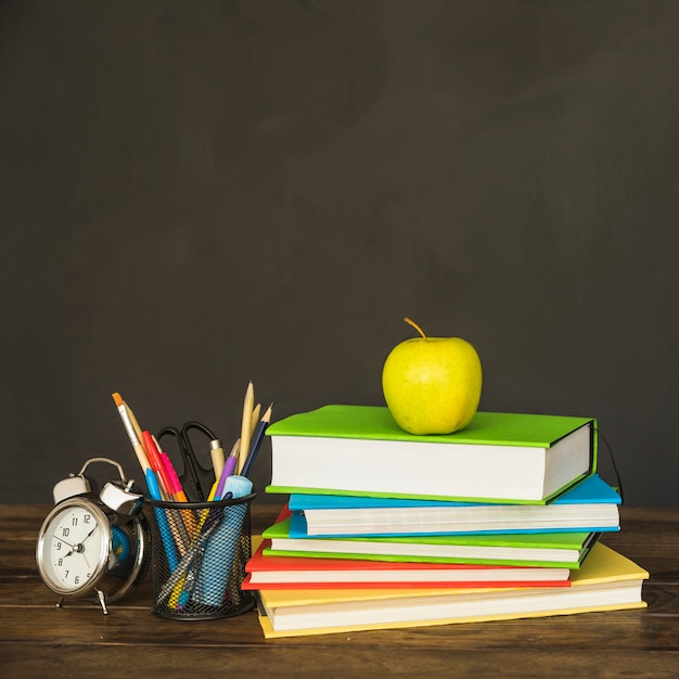 Free photo books with stationery and clocks on table