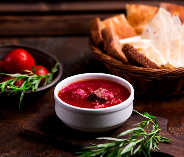 Free Photo borsch with meat in a white bowl