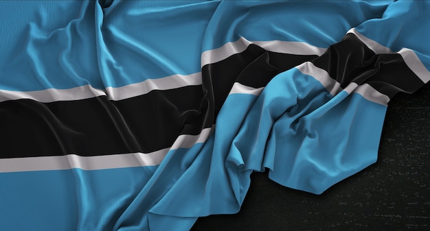 Free photo botswana flag wrinkled on dark background 3d render