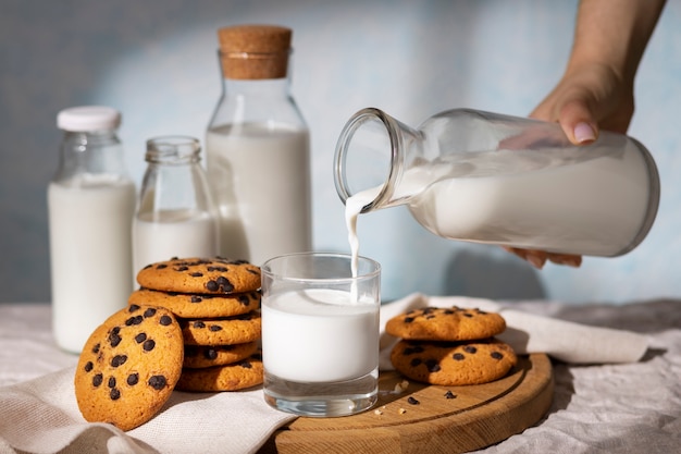 Bottle of milk with sweet cookies