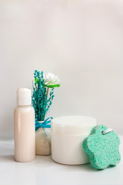 Bottles for cosmetics and sponge