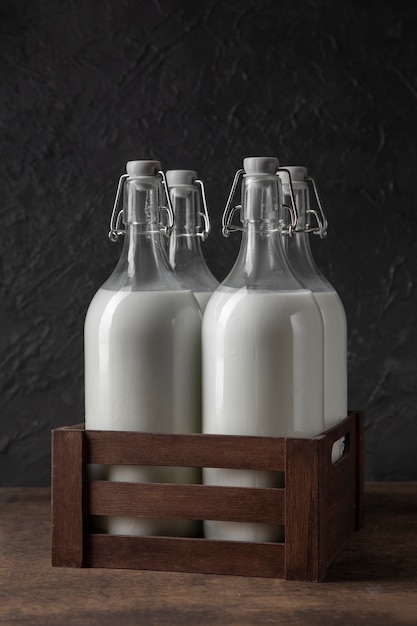 Free photo bottles of milk arrangement still life