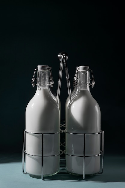 Free photo bottles of milk arrangement still life