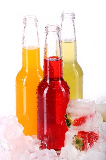 Free Photo bottles with colorful cocktail and ice