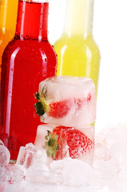 Free Photo bottles with colorful cocktail and ice