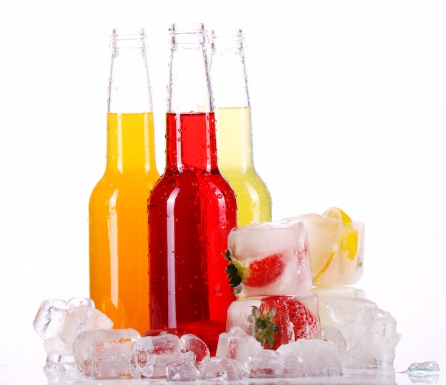 Free photo bottles with colorful cocktail and ice