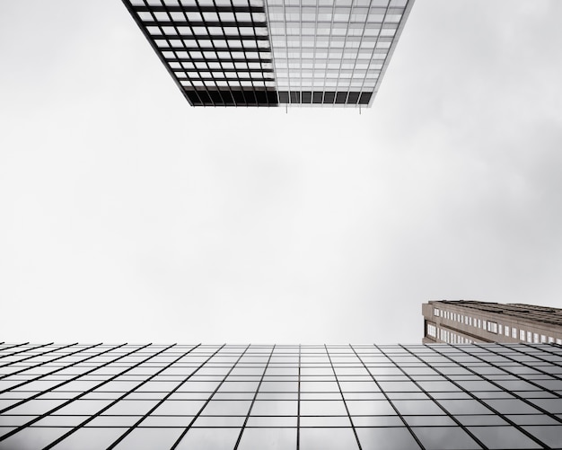 Bottom view modern glass buildings