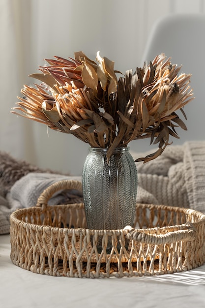 Free photo bouquet of dried protea flowers in living room home still life