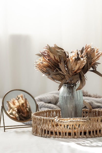 Free photo bouquet of dried protea flowers in living room home still life