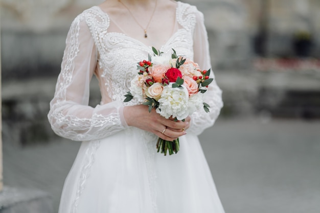 Bouquet of flowers in bride's hands