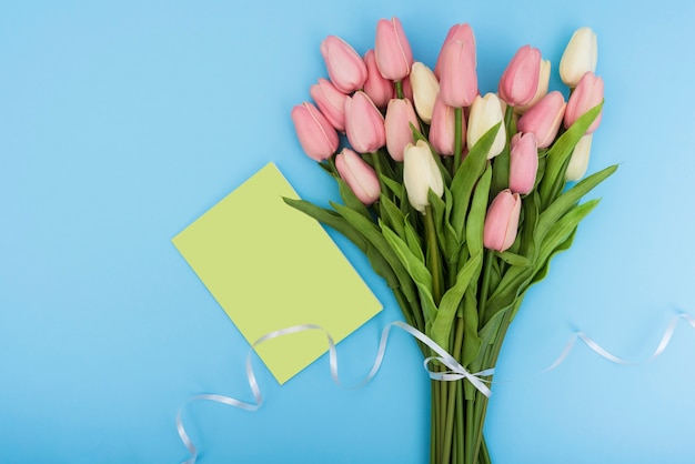 Bouquet of tulips with green card