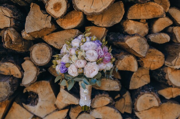 Bouquet with staked log background