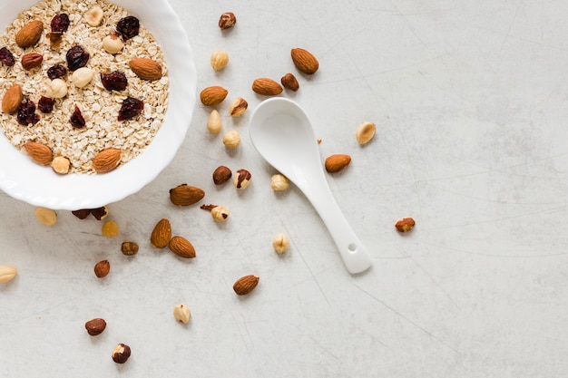 Bowl of oats with raisins and nuts