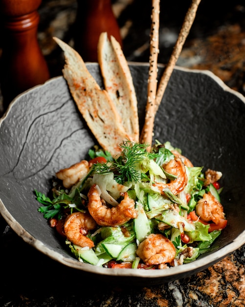 bowl of shrimp salad with teriyaki sauce