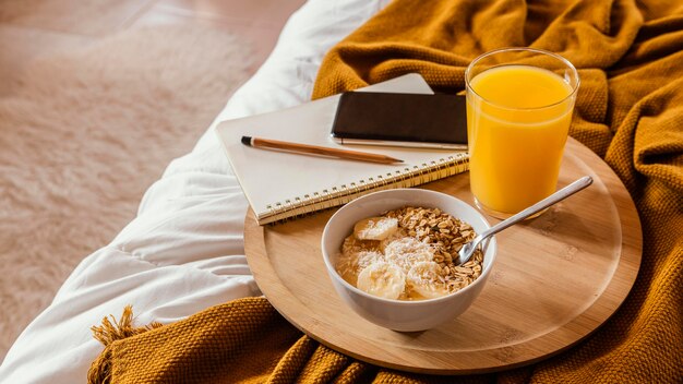 Bowl with cereal and banana high angle