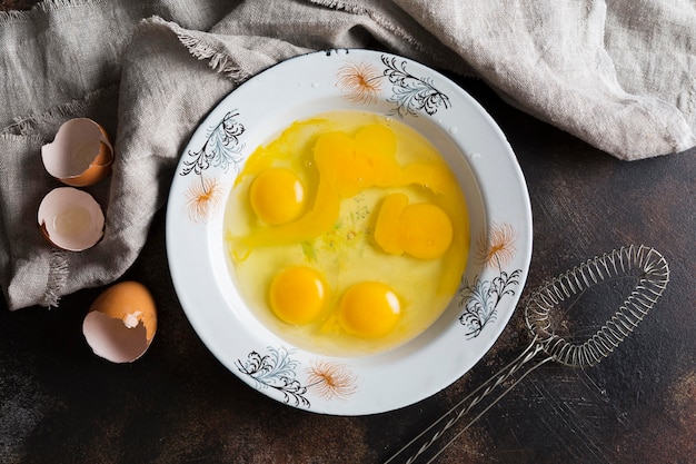 Free photo bowl with eggs yolk