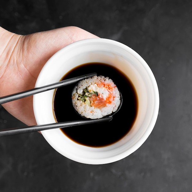 Bowl with sauce for sushi