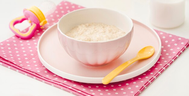 Bowl with yougurt on table