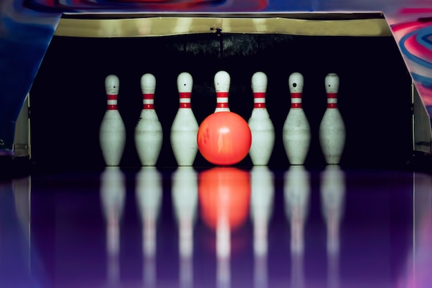 Bowling ball crashing into skittles