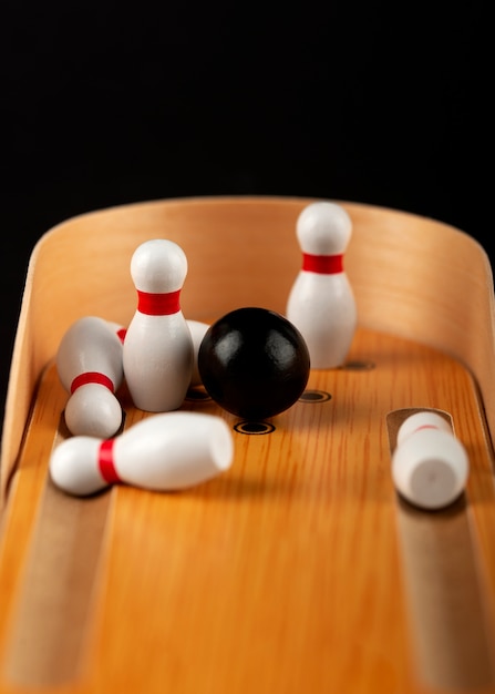 Free Photo bowling pins and ball arrangement