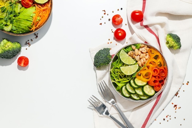 Bowls with tasty and nutritious food top view