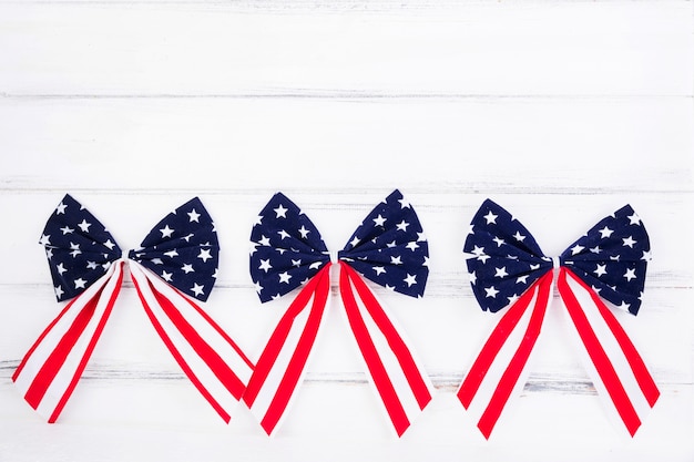 Free Photo bows of ribbons with symbols of american flag