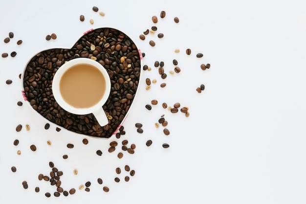 Box of coffee beans with coffee cup