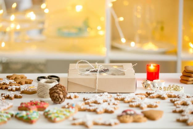 Box of cookies, gingerbread cookies of different shapes, white d