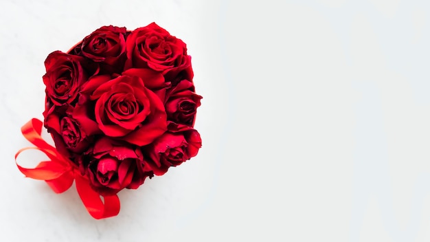 Free photo box of red roses background