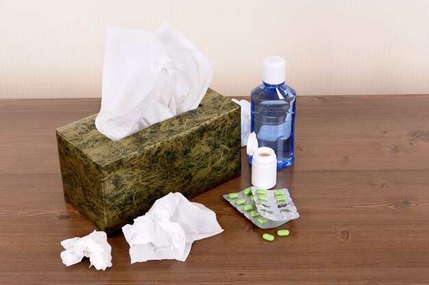 Box of tissues and medicine 