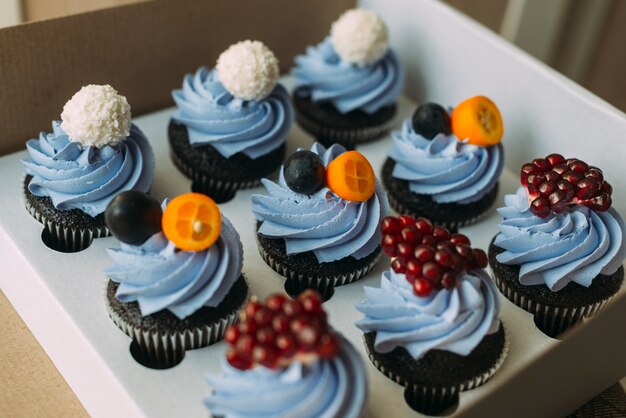 Box with yummy muffins