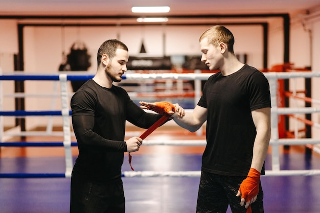 Free Photo boxers train in the ring and in the gym