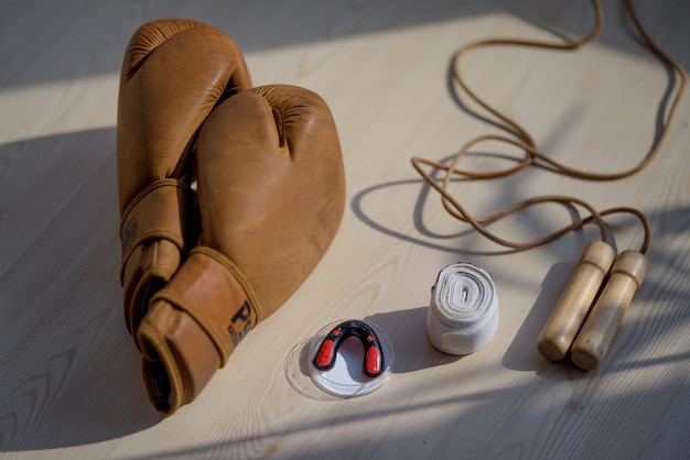 boxing gear on a wooden surface