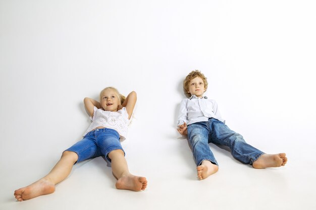 Boy and girl, best friends or brother and sister having fun