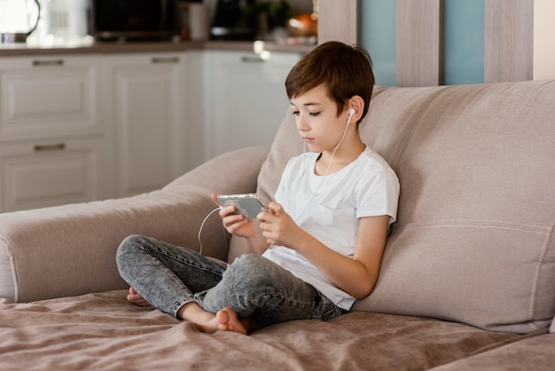 Boy at home playing games