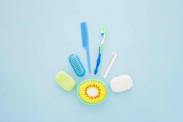 Free photo boy hygienic accessories on blue surface