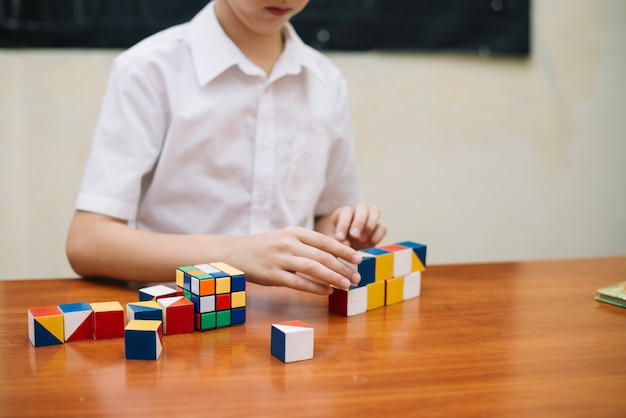 Boy playing with puzzle