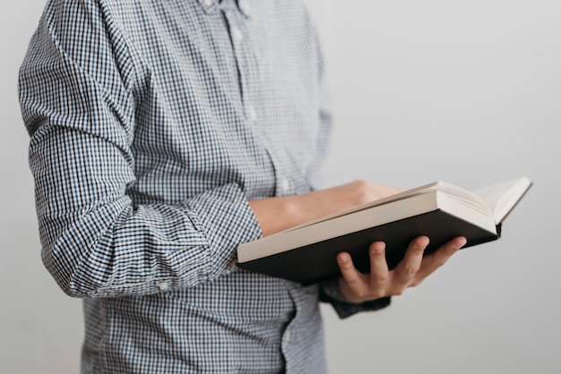 Boy reading a holy book