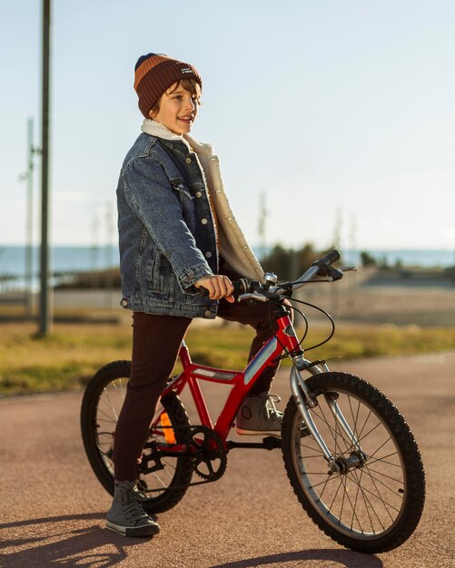 Boy riding his bike outdoors in the city