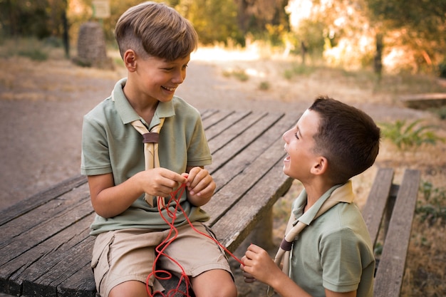 Free photo boy scouts spending time in nature